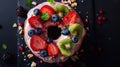 A donut is decorated with a variety of colorful and fruity toppings