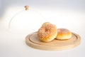 donut. donut under glass cloche