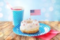 Donut with juice and american flag decoration