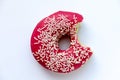 Donut with a mouth bite. Eaten Royalty Free Stock Photo