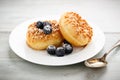 Donut with nuts and blueberries