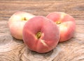 Donut peaches isolated on wooden background Royalty Free Stock Photo
