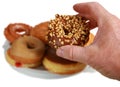 A donut in a persons hand Royalty Free Stock Photo