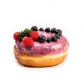 Donut with pink cream and berries, isolated on white background. View from side Royalty Free Stock Photo