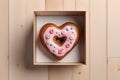 Donut in the shape of a heart. Valentine's Day Gift Concept. Royalty Free Stock Photo