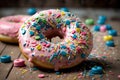 Donut with sprinkles on a wooden background. Selective focus. Royalty Free Stock Photo