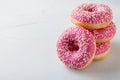 Donut. Sweet icing sugar food. Dessert colorful snack.Treat from delicious pastry breakfast. Bakery cake. Doughnut with frosting.