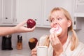 Donut vs. Fruit Healthy Eating Decision Royalty Free Stock Photo