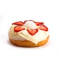 Donut with white cream and strawberry slices, isolated on white background. View from side Royalty Free Stock Photo