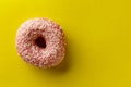 Donut on yellow background. Top view. Copy space. Royalty Free Stock Photo