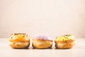Donuts. Assorted donuts lying on a white table on white background. ÃÂ¡oncept sweet food Royalty Free Stock Photo
