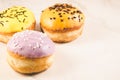 Donuts. Assorted donuts lying on a white table, copy space. Selective focus. ÃÂ¡oncept sweet food Royalty Free Stock Photo