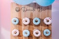 Donuts bar. Baby Shower party decor. Delicious reception. Celebration concept. Trendy candy bar. Table with sweets, dessert. Photo Royalty Free Stock Photo