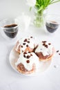 Donuts and black coffee on a white background. Royalty Free Stock Photo