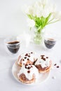 Donuts and black coffee on a white background. Royalty Free Stock Photo