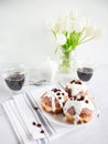Donuts and black coffee on a white background. Royalty Free Stock Photo