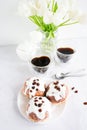 Donuts and black coffee on a white background. Royalty Free Stock Photo