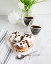 Donuts and black coffee on a white background. Royalty Free Stock Photo