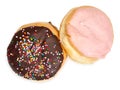 Donuts with chocolate icing and sprinkles. Donut with cherry jam and glaze. Isolated on white background, top view, close-up Royalty Free Stock Photo