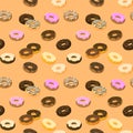 Donuts colored seamless pattern. Vector.