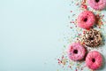 Donuts colorful background on blue, ceebration Royalty Free Stock Photo