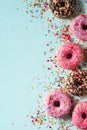 Donuts colorful background on blue, ceebration Royalty Free Stock Photo