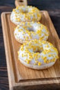 Donuts on cutting board Royalty Free Stock Photo