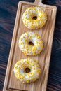 Donuts on cutting board Royalty Free Stock Photo