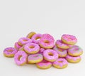 Donuts decorated icing and sprinkles on white background