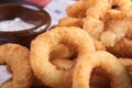 Donuts, fried on hot fan, with the most tasty white and red sauce. Hot and very high-calorie dessert
