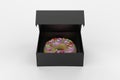 Donuts glazed with colorful sugar icing and topped with sprinkles