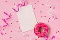 Donuts with icing on pastel pink background with copyspace. Sweet donuts. Royalty Free Stock Photo