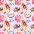 Donuts, macaroon and jelly beans seamless pattern on a pink background Royalty Free Stock Photo