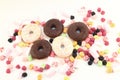Donuts, many bright candies and marshmallows