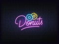 Donuts neon glowing sign. Bright vector label of donuts and lettering