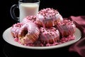 Donuts with pink icing and 3D chocolate realistic objects set of food Royalty Free Stock Photo