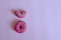 Donuts with pink icing Royalty Free Stock Photo