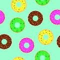 Donuts seamless pattern on blue background Royalty Free Stock Photo