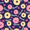 Donuts seamless pattern on dark blue background with pink hearts. Desserts vector background in flat cartoons style.