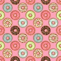 Donuts seamless pattern on pink background Royalty Free Stock Photo