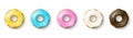 Donuts set isolated on a white background. Cute, colorful and glossy donuts with glaze and powder. Yellow, pink, vanilla, blue and Royalty Free Stock Photo