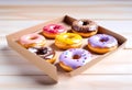 donuts set in paper box on white Royalty Free Stock Photo