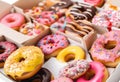 donuts set in paper box on white Royalty Free Stock Photo