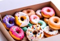 donuts set in paper box on white Royalty Free Stock Photo