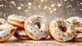 Donuts with white glaze and gold sprinkles. Festive background. Sugar, sweets, snack, junk food, birthday, concept. Top view. Royalty Free Stock Photo