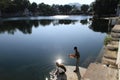 2 men cooling down by the Dudh Talai Lake and Gardens in Udaipur, Rajasthan, India Royalty Free Stock Photo