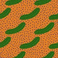 Doodle cucumber seamless pattern on dots background. Cucumbers vegetable endless wallpaper