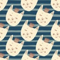 Doodle seamless pattern with cats and crowns. Navy blue background with strips. Botanical and animal print