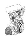 Doodle sketch of Christmas sock in black and white zentangle design