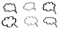 Doodle thinking clouds, chat cartoon bubbles. Hand drawn set. Royalty Free Stock Photo